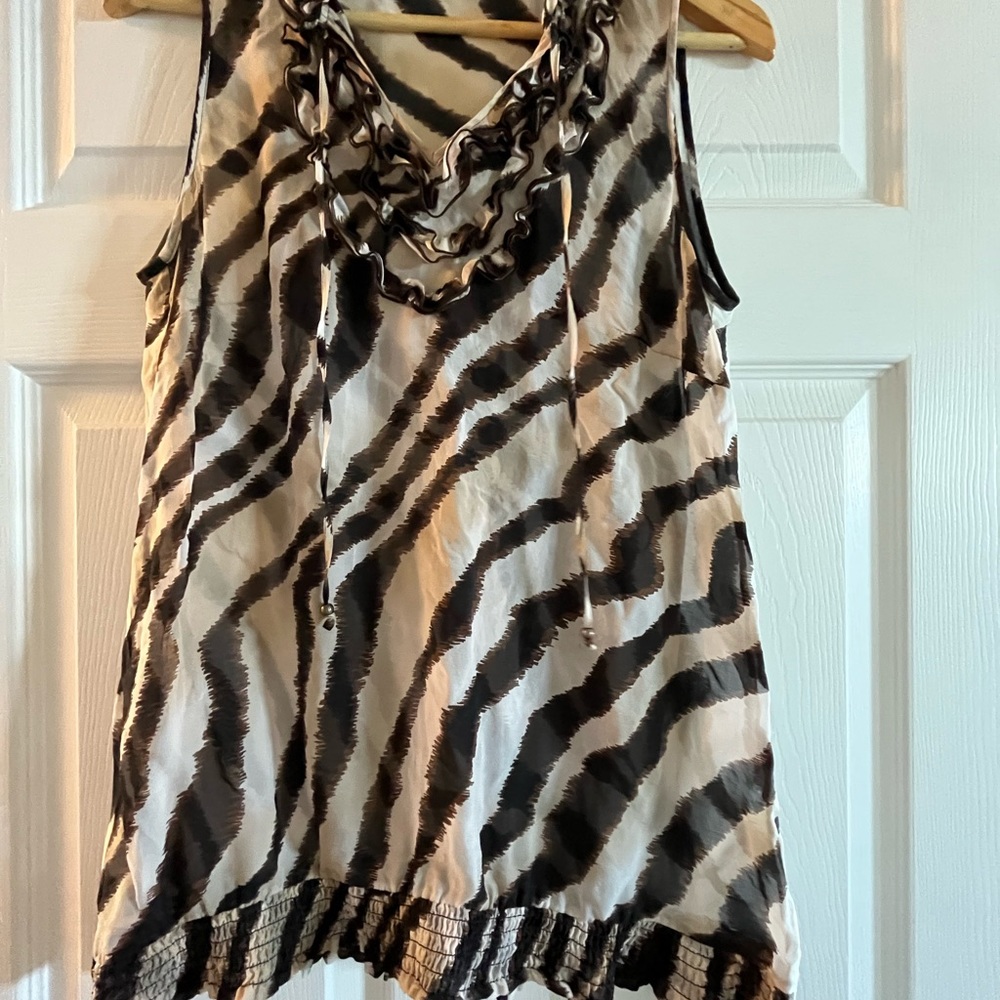 Versatile animal print summer blouse.